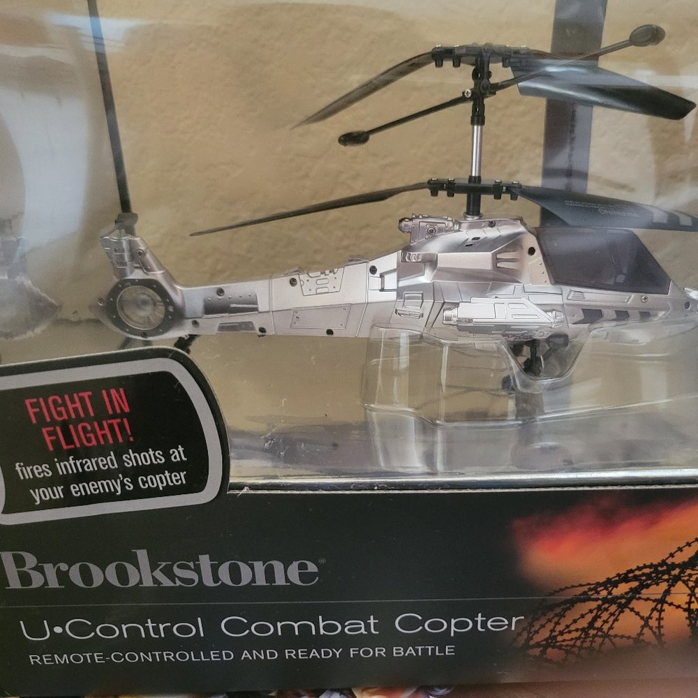 NIB -- Brookstone Silver U Control Remote Controlled Combat Copter